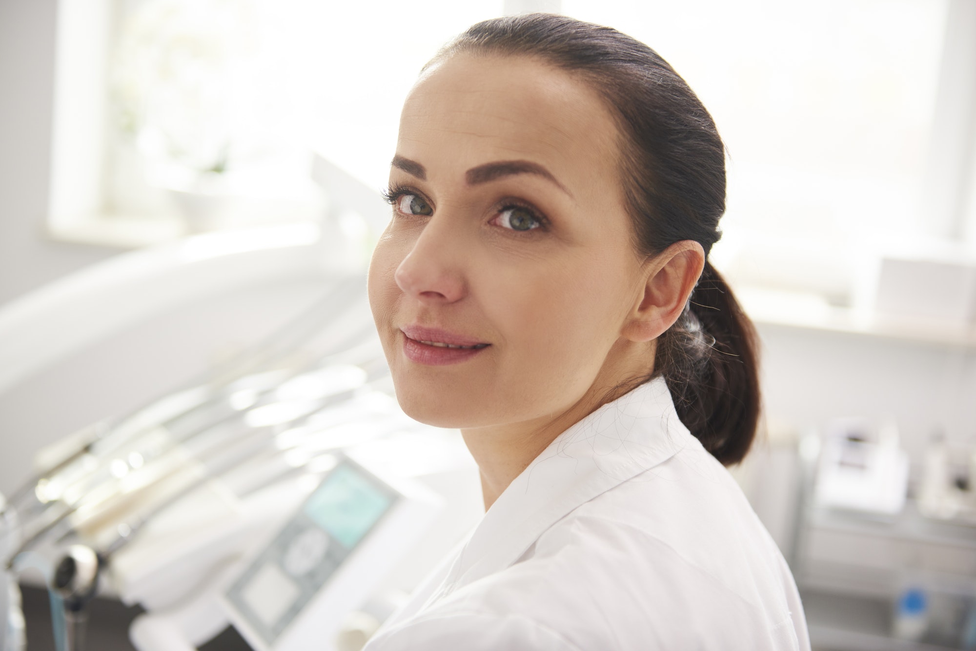 Young, female dentist in dentist's clinic